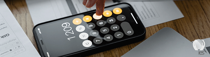 calculator on a desk with paperwork