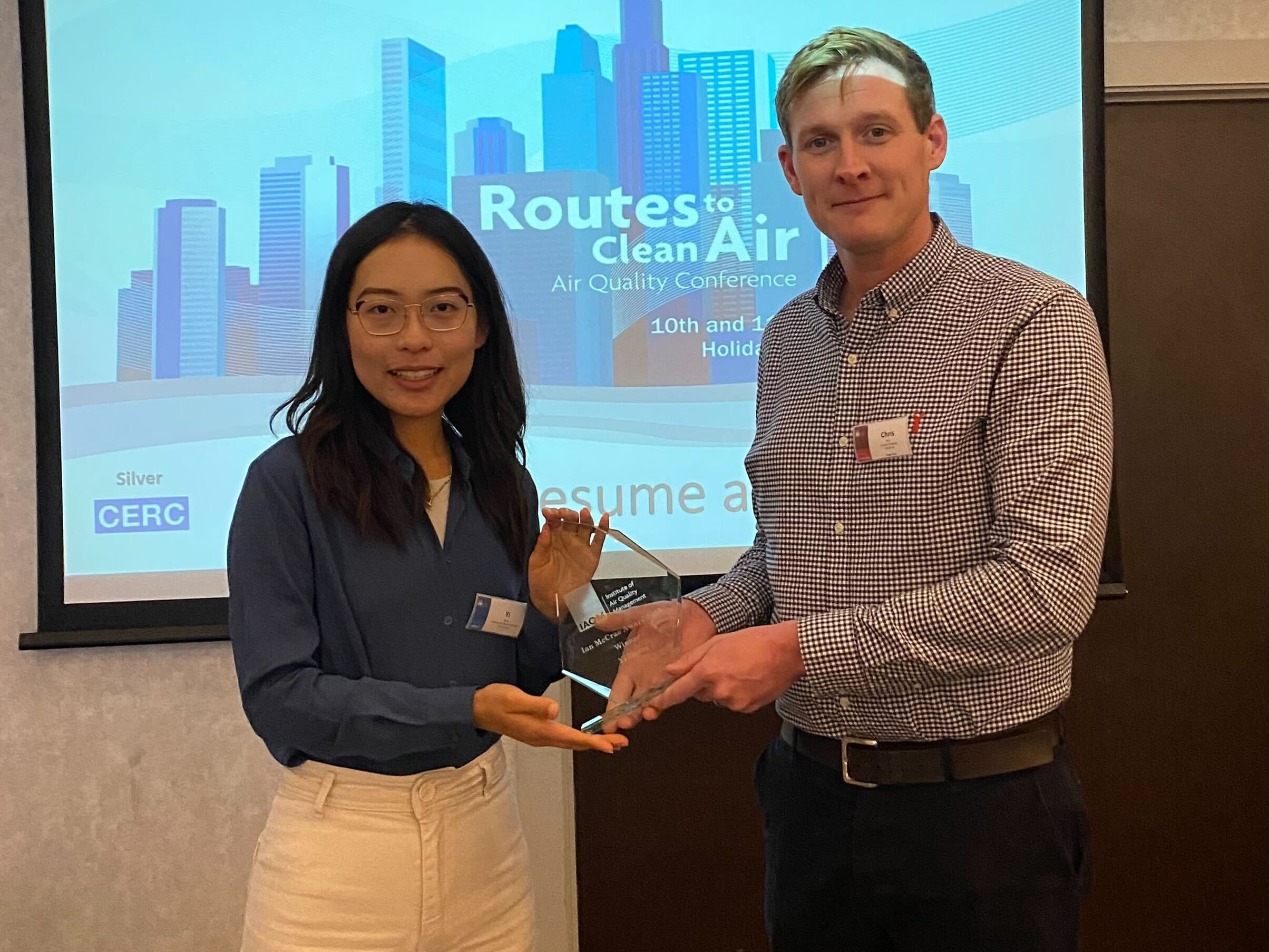 Yi Zhang receives Ian McCrae Award from Chris Rush