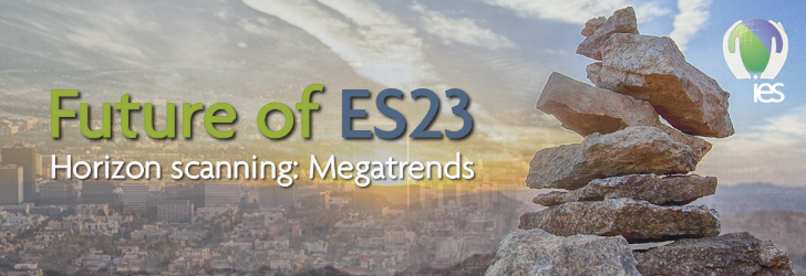 sprawling megacity fading into sunrise with aesthetically stacked rocks with overlaid text "Future of ES23 horizon scanning: Megatrends