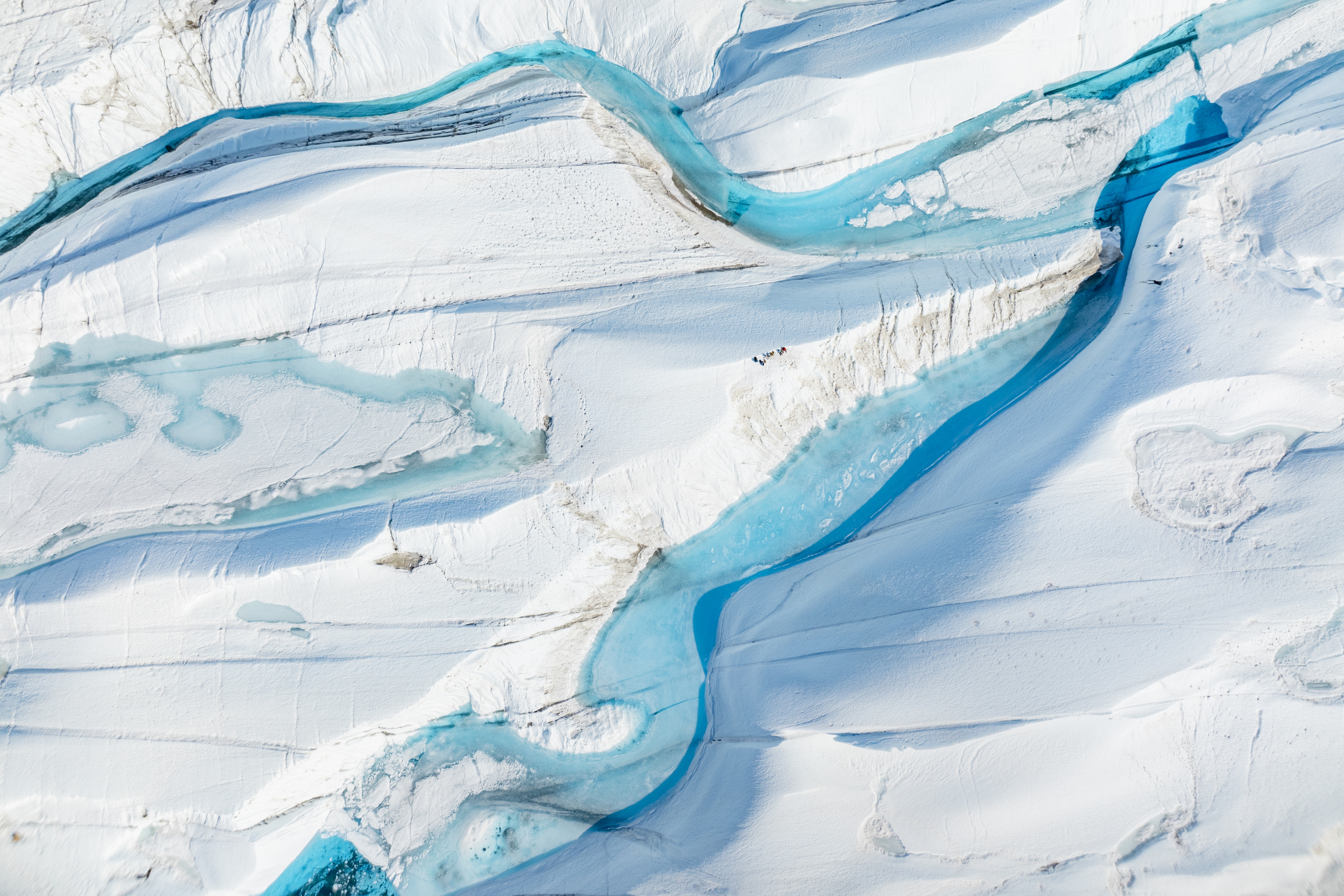 Aerial photo of small group of people in Antarctica 