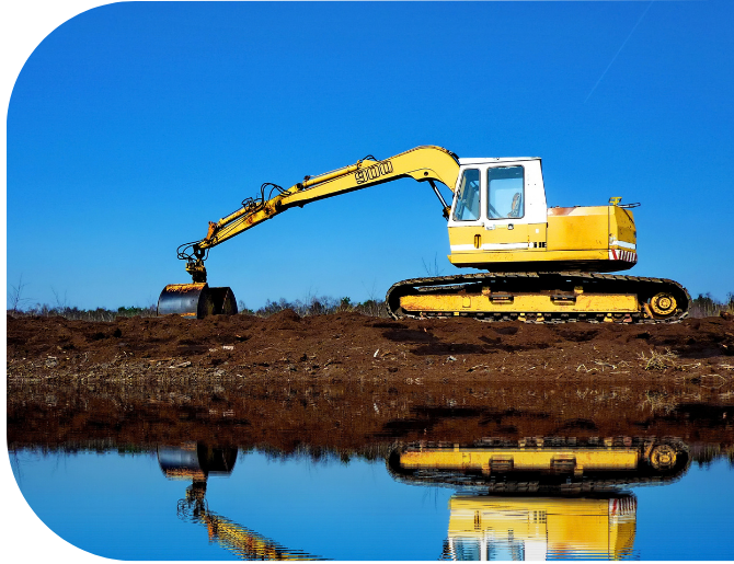 Digger with reflection in water