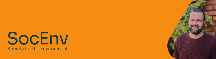 Headshot of Adam Donnan and SocEnv logo against an orange background