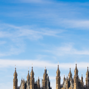UK Parliament with a bus passing over the River Thames