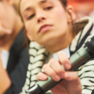 Audience speaking up at a microphone