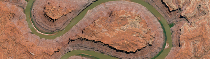 meandering river through a dusty land