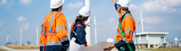 Engineers looking at wind turbine
