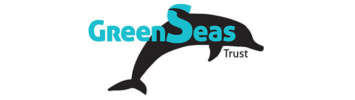 A logo with a black dolphin against a white background, with the words GreenSeas Trust in blue writing across the image.