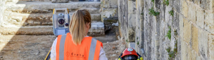 Photograph of two heritage professionals on site