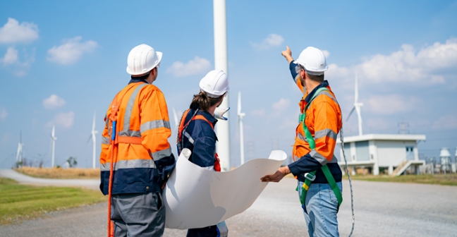 Engineers looking at wind turbine