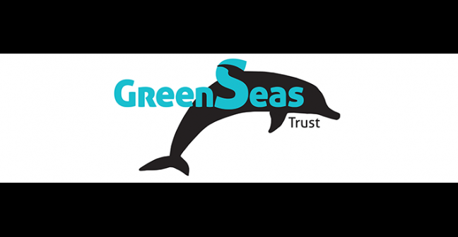 A logo with a black dolphin against a white background, with the words GreenSeas Trust in blue writing across the image.