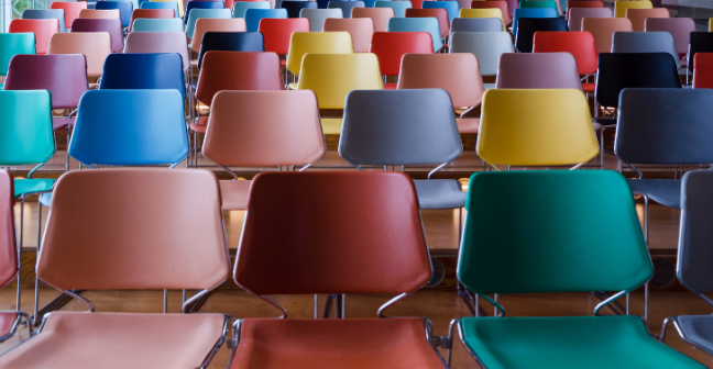 Rows of empty colourful chairs