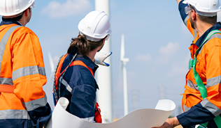 Engineers looking at wind turbine