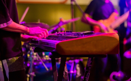 keyboardist playing with a band