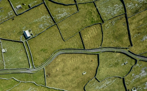 Aerial shot of stone walls dividing fields
