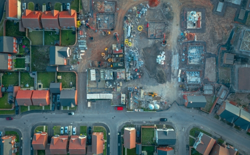 Housing development in construction, aerial view