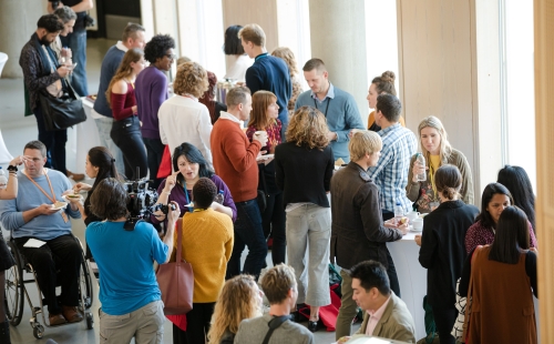 People talking during a conference break 