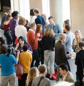 People talking during a conference break