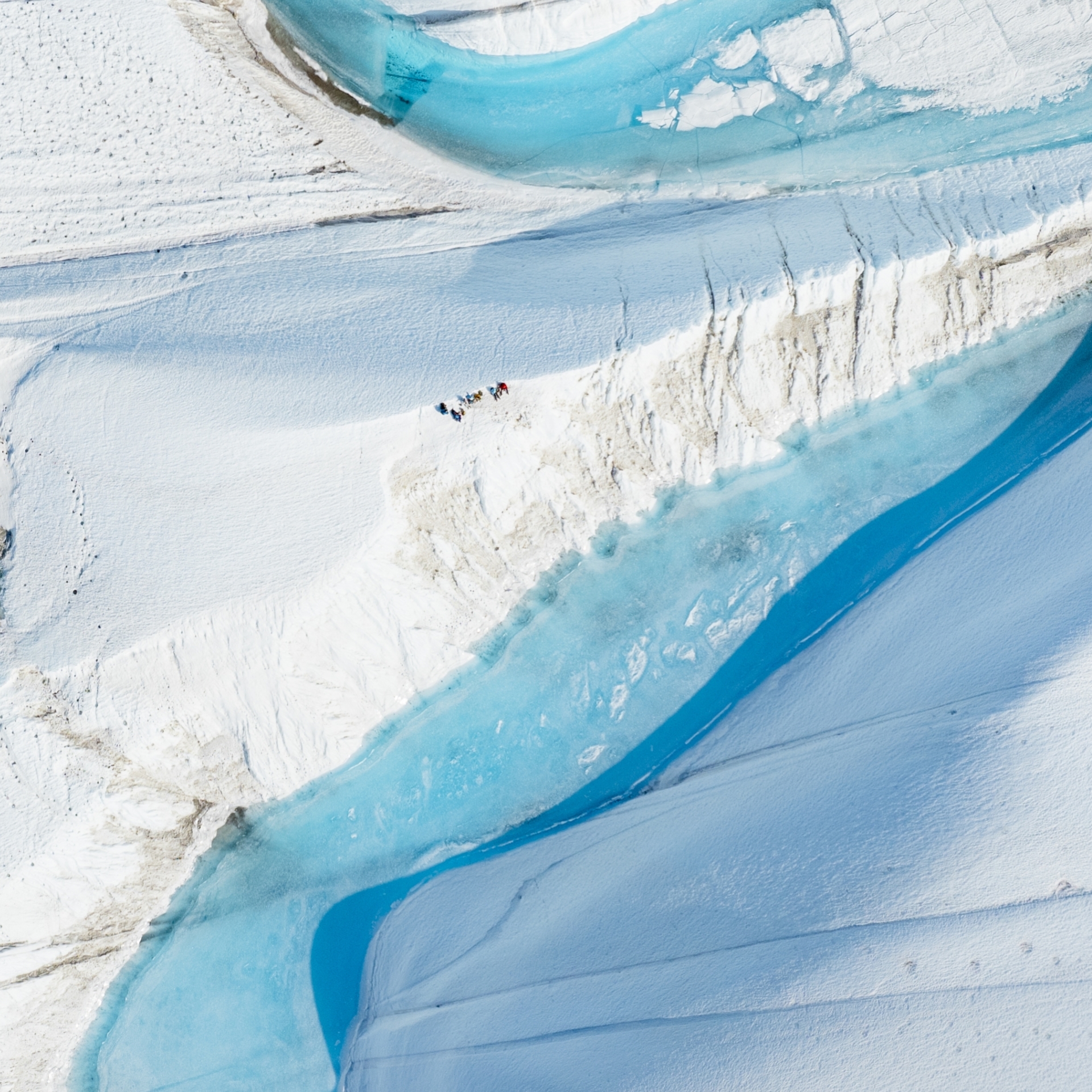 Aerial photo of small group of people in Antarctica 